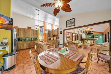 Discover a serene 1.7-acre retreat of lush, fully gated gardens - photo 17