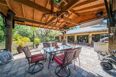 Discover a serene 1.7-acre retreat of lush, fully gated gardens - photo 29