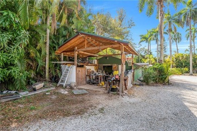 Discover a serene 1.7-acre retreat of lush, fully gated gardens - photo 33