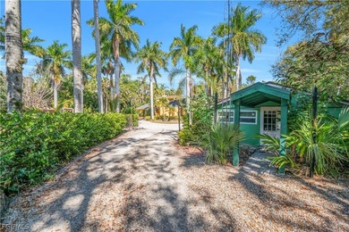 Discover a serene 1.7-acre retreat of lush, fully gated gardens - photo 35