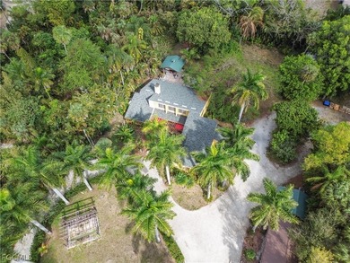 Discover a serene 1.7-acre retreat of lush, fully gated gardens - photo 50