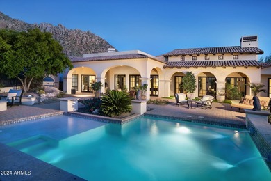 This timeless styled Spanish Colonial home rests in guard gated - photo 1
