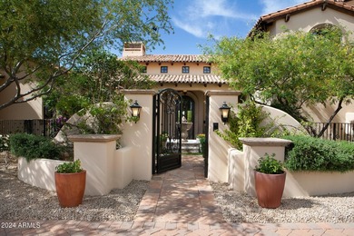 This timeless styled Spanish Colonial home rests in guard gated - photo 2