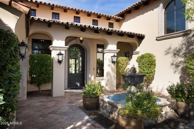 This timeless styled Spanish Colonial home rests in guard gated - photo 4
