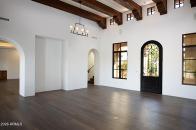 This timeless styled Spanish Colonial home rests in guard gated - photo 5