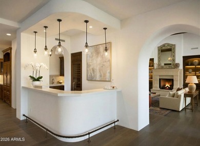 This timeless styled Spanish Colonial home rests in guard gated - photo 8