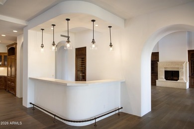 This timeless styled Spanish Colonial home rests in guard gated - photo 9