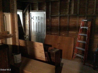 This family-owned two-family home has never been rented. First - photo 12