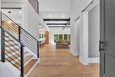 Located in the highly sought-after Norman Pointe community, this - photo 12