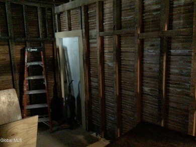 This family-owned two-family home has never been rented. First - photo 13