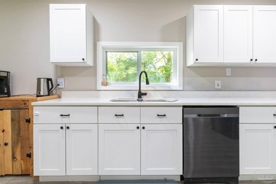 This beautifully updated 4-bedroom, 1.5-bath home offers the - photo 13