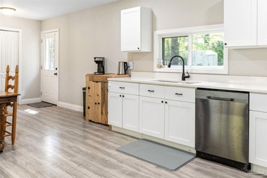 This beautifully updated 4-bedroom, 1.5-bath home offers the - photo 14