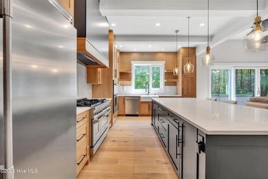Located in the highly sought-after Norman Pointe community, this - photo 19