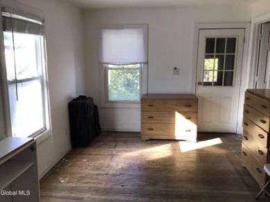 This family-owned two-family home has never been rented. First - photo 21