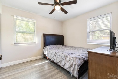 This beautifully updated 4-bedroom, 1.5-bath home offers the - photo 23