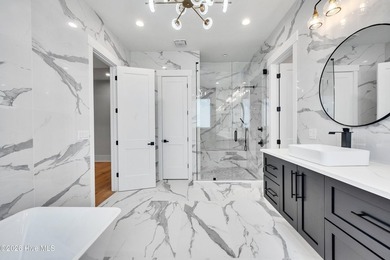 Located in the highly sought-after Norman Pointe community, this - photo 25