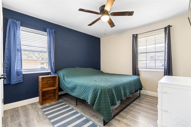 This beautifully updated 4-bedroom, 1.5-bath home offers the - photo 25