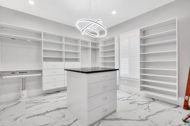 Located in the highly sought-after Norman Pointe community, this - photo 28