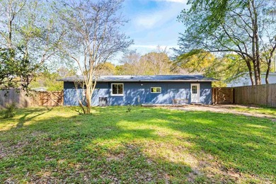 This beautifully updated 4-bedroom, 1.5-bath home offers the - photo 28