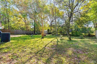 This beautifully updated 4-bedroom, 1.5-bath home offers the - photo 29
