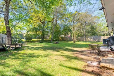 This beautifully updated 4-bedroom, 1.5-bath home offers the - photo 30