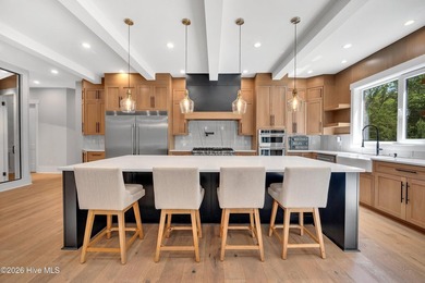 Located in the highly sought-after Norman Pointe community, this - photo 46