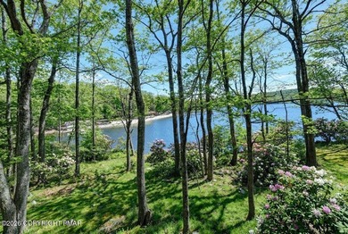 ***LAKEFRONT***AND SLEEPING LOFT. Nestled in the serene and - photo 39