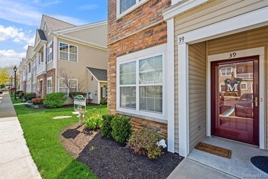 Welcome to this highly sought-after first-floor end unit located - photo 2