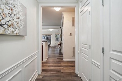 Welcome to this highly sought-after first-floor end unit located - photo 5