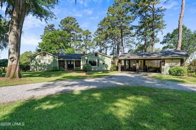This rare 1.15-acre double lot offers something increasingly - photo 1