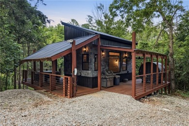 Secluded on 32.36 acres along the Kings River, this - photo 18