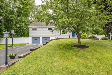 Exceptional and move-in ready split-level gem in the highly - photo 2
