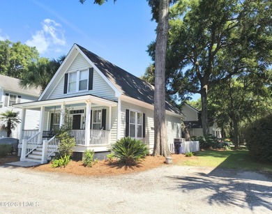 This beautifully designed home offers the ease of - photo 3