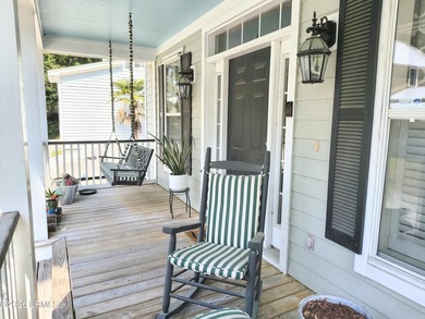 This beautifully designed home offers the ease of - photo 4