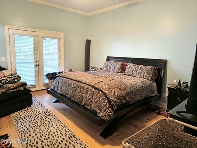 This beautifully designed home offers the ease of - photo 8