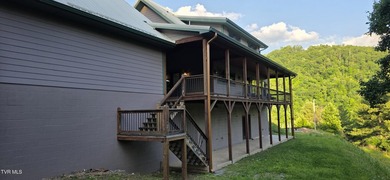 Nestled in the Mountains of East TN and overlooking Watauga Lake - photo 5