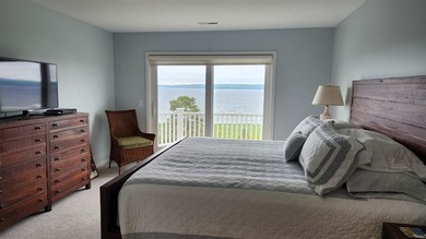 Perched above the Lake Michigan shoreline, this stunning - photo 13