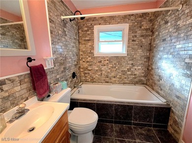 Welcome HOME to 9112 Parmelee Ave, in Cleveland! A charming and - photo 25