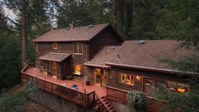 Perched atop a private knoll in the redwoods of the Glenwood - photo 50