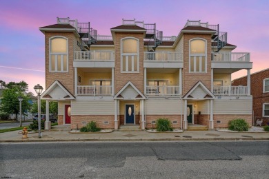 This upscale 3-story townhome has a wonderful water view of