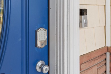 This upscale 3-story townhome has a wonderful water view of