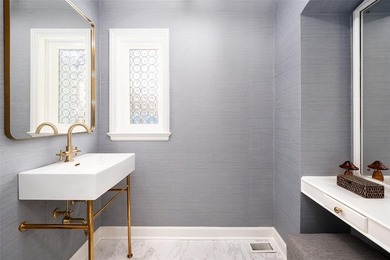 Located in Highland Park, this beautifully reimagined residence