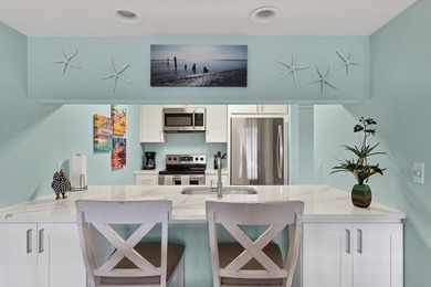 Ease into the Florida lifestyle in this thoughtfully renovated - photo 9
