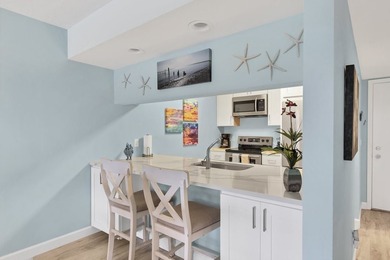 Ease into the Florida lifestyle in this thoughtfully renovated - photo 10
