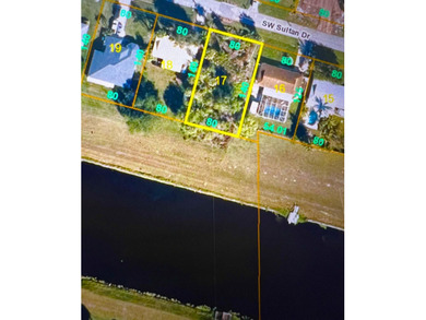 Rare opportunity to own an oversized lot on the C-24 canal which - photo 1