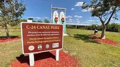 Rare opportunity to own an oversized lot on the C-24 canal which - photo 9