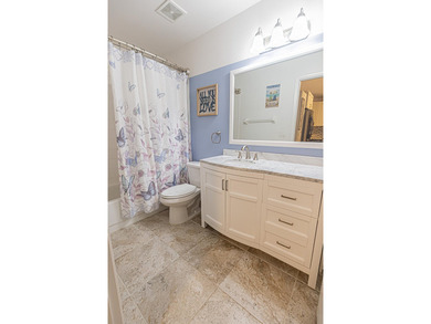 Welcome to this beautifully updated corner villa in the - photo 12