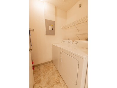 Welcome to this beautifully updated corner villa in the - photo 13
