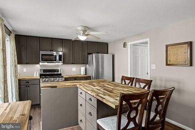 Welcome to this spacious 5-bedroom, 2.5-bath home nestled in the - photo 19