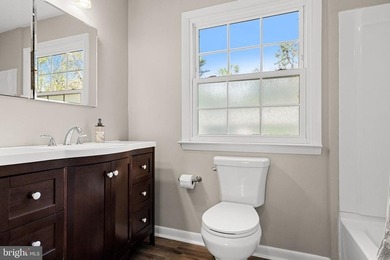 Welcome to this spacious 5-bedroom, 2.5-bath home nestled in the - photo 23